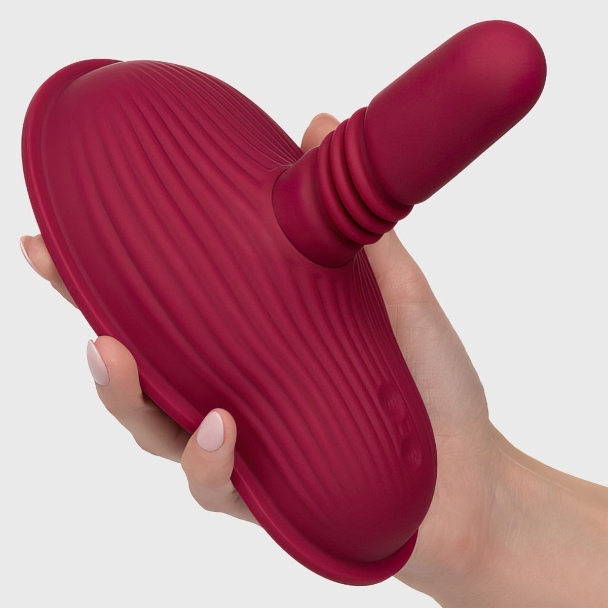 hand holding Cal Exotics Dual Rider Thrust & Grind