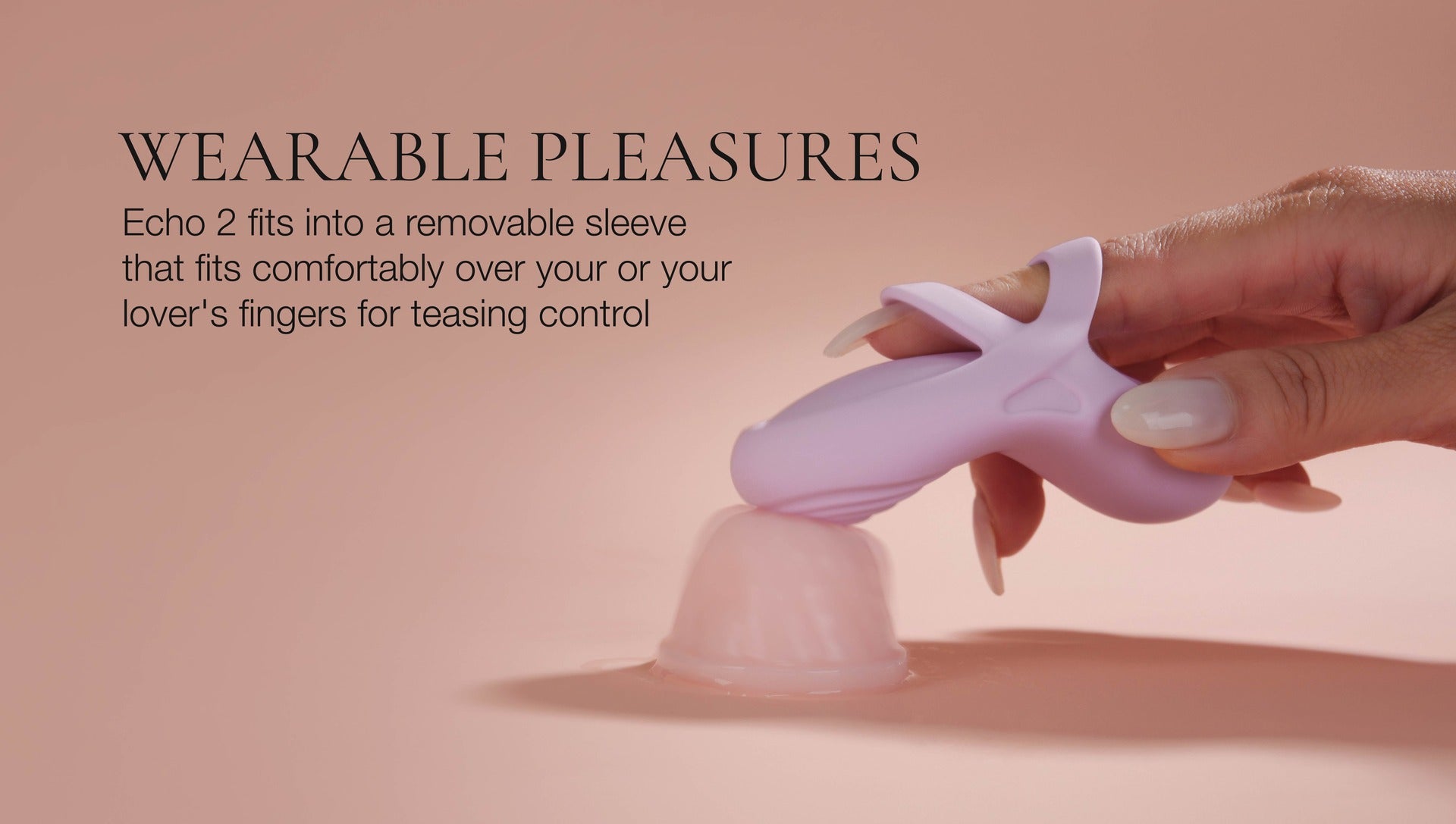 Pink wearable pleasure device held by a hand with text about 'Wearable Pleasures' on a pink background.
