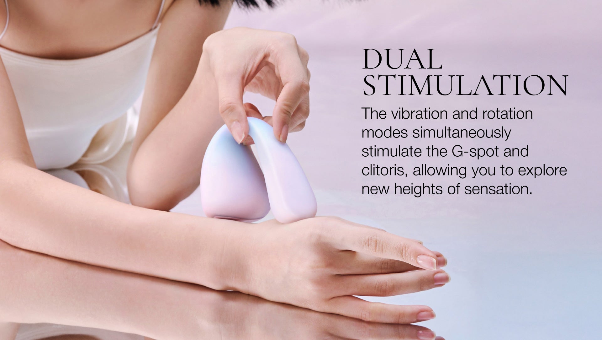 Vibrator being held by a person with text about dual stimulation.