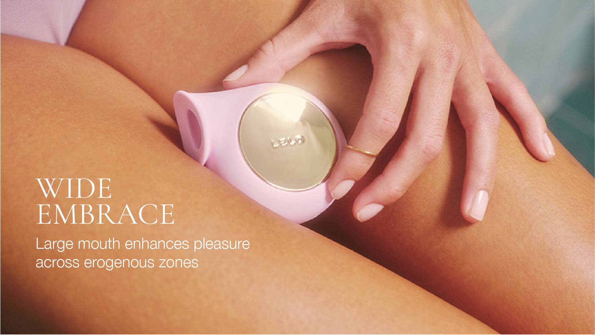 Pink and gold device on a person's leg with text about its features.