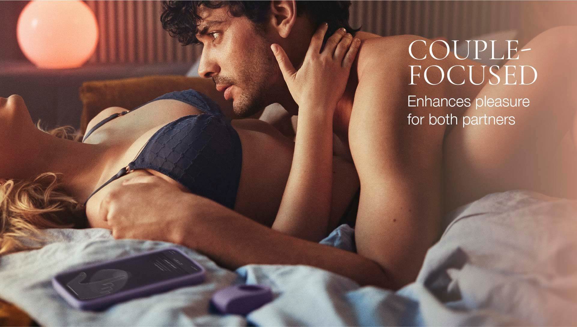 Couple in bed with a product between them, text 'Couple Focused' on the side.