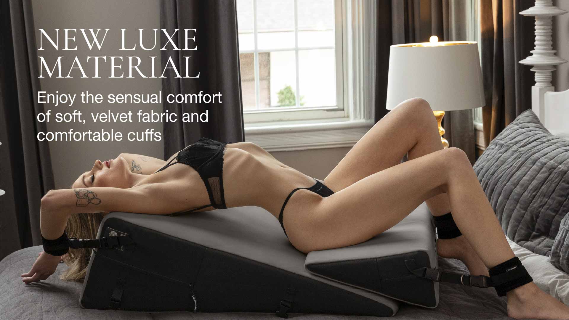 Person lying on a foam ramp combo with text about new luxe material