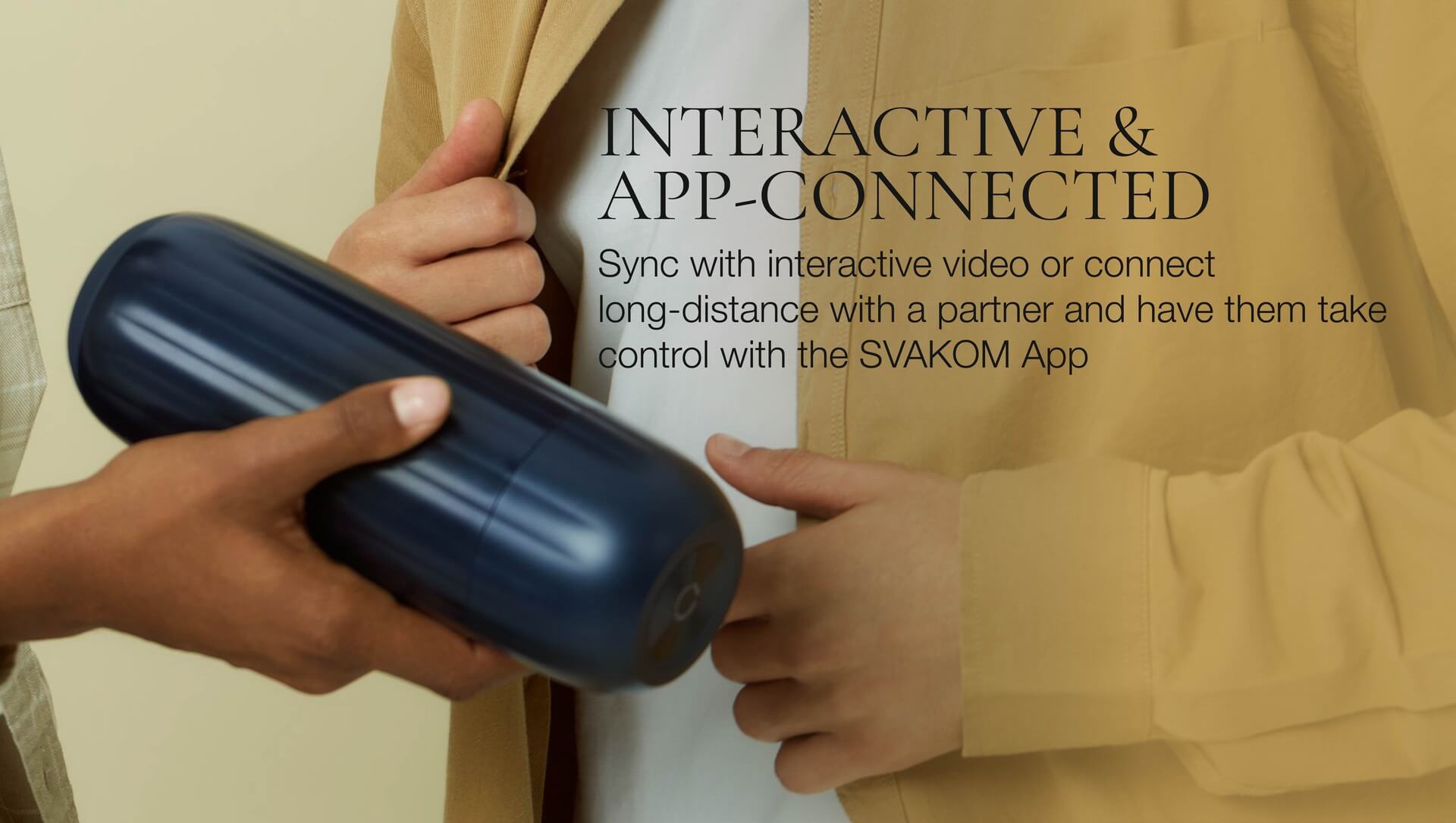 Hand holding a blue device with text about interactive and app-connected features.
