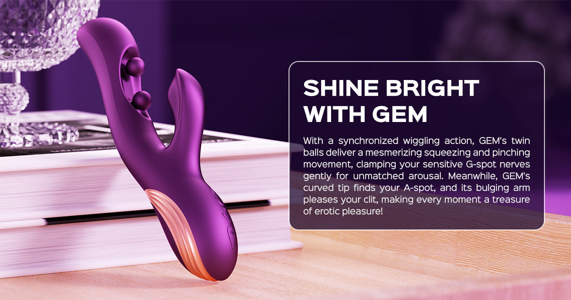 Purple G-spot stimulator with text on a wooden surface