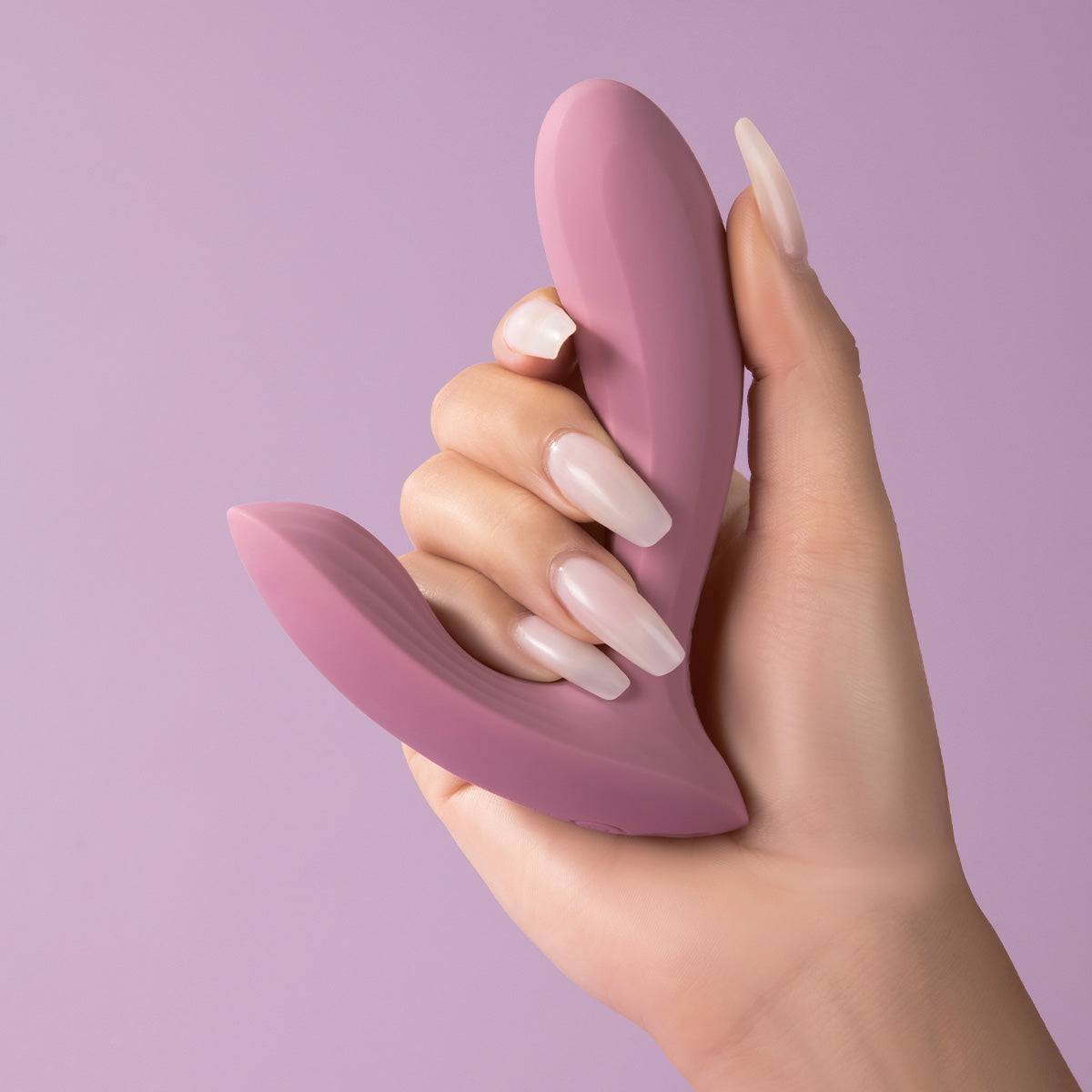 Woman holding the Erica Wearable Vibrator by Svakom