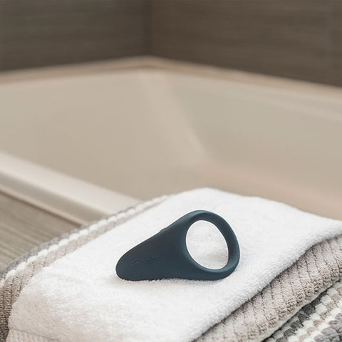 We-Vibe Verge P-Spot Vibrating Ring laying on a towel in bathroom