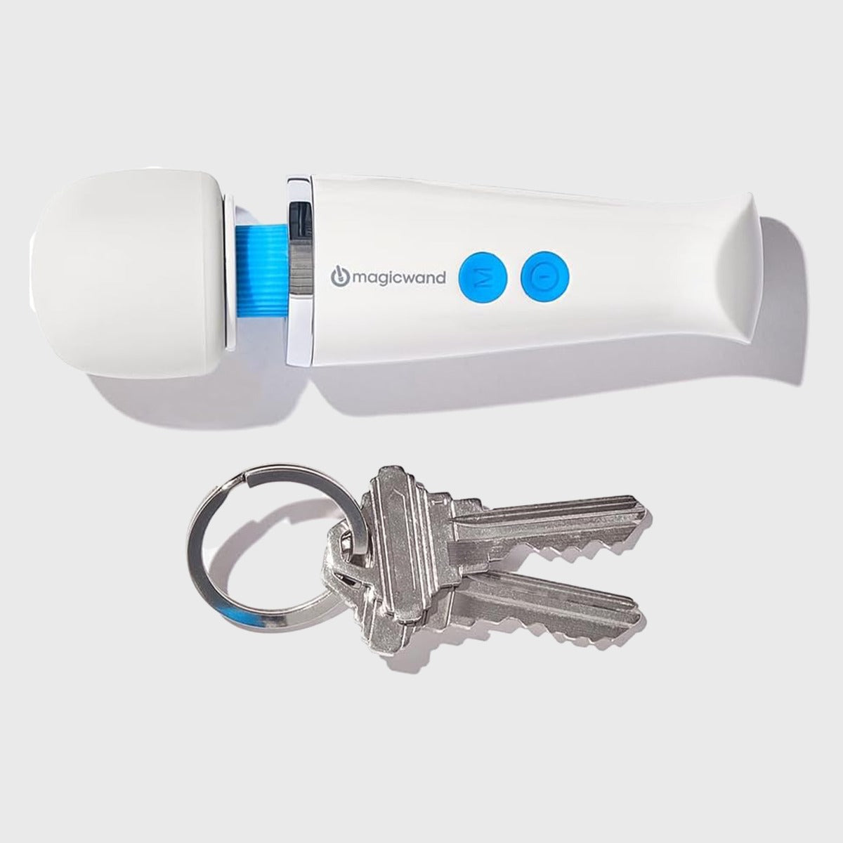 Magic Wand Micro next to a set of keys for size reference 