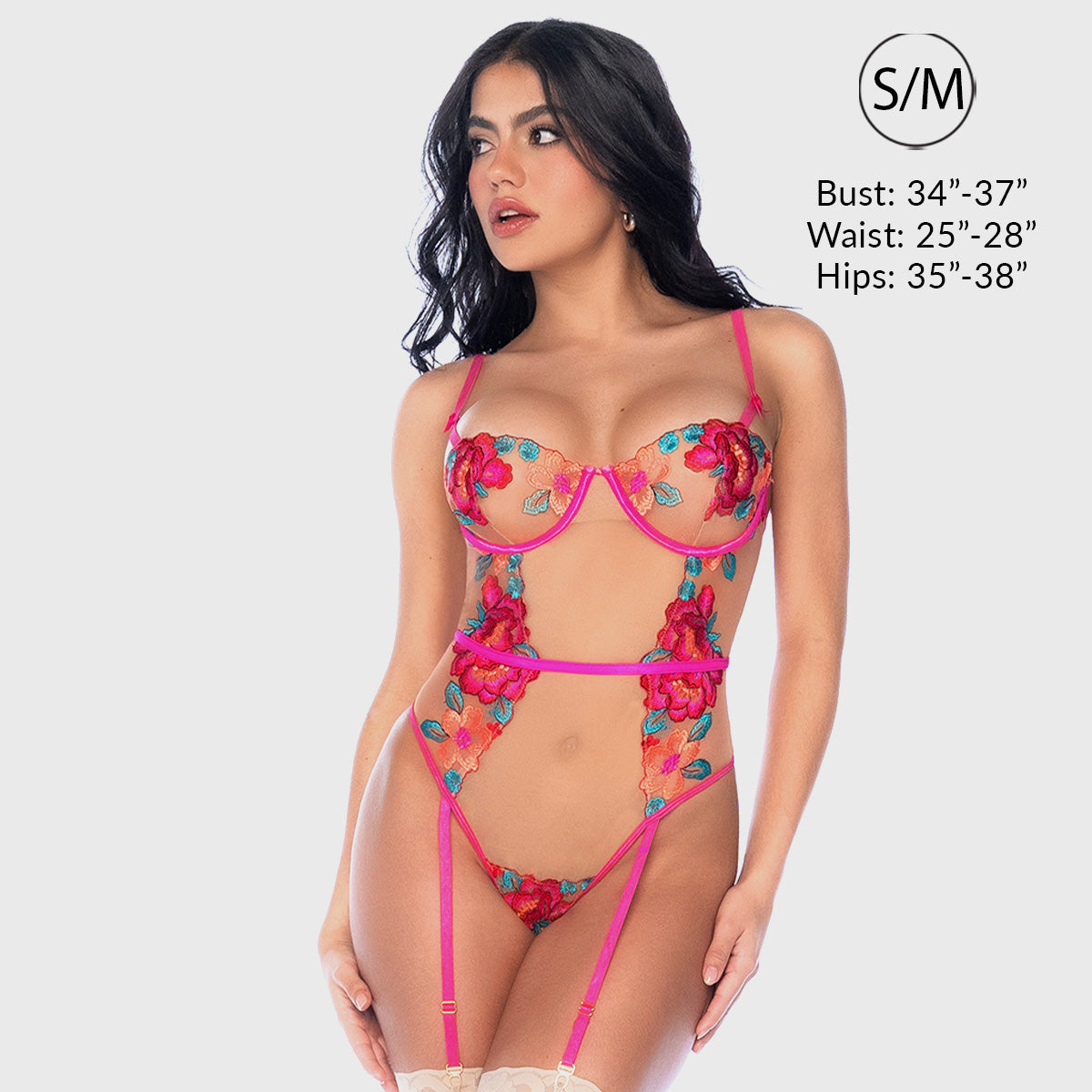 Woman wearing a floral lingerie set with size information on a white background