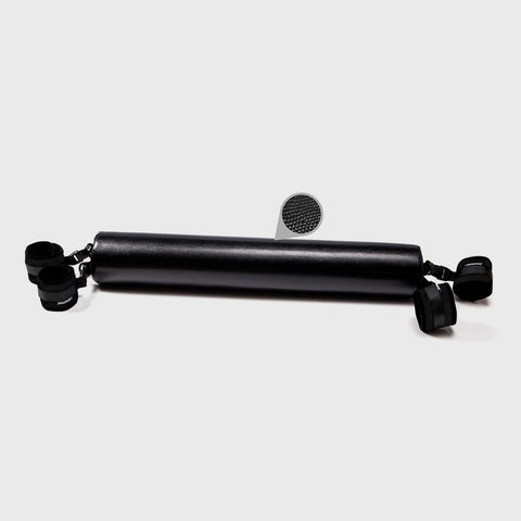 Black spreader bar with attachments on a white background
