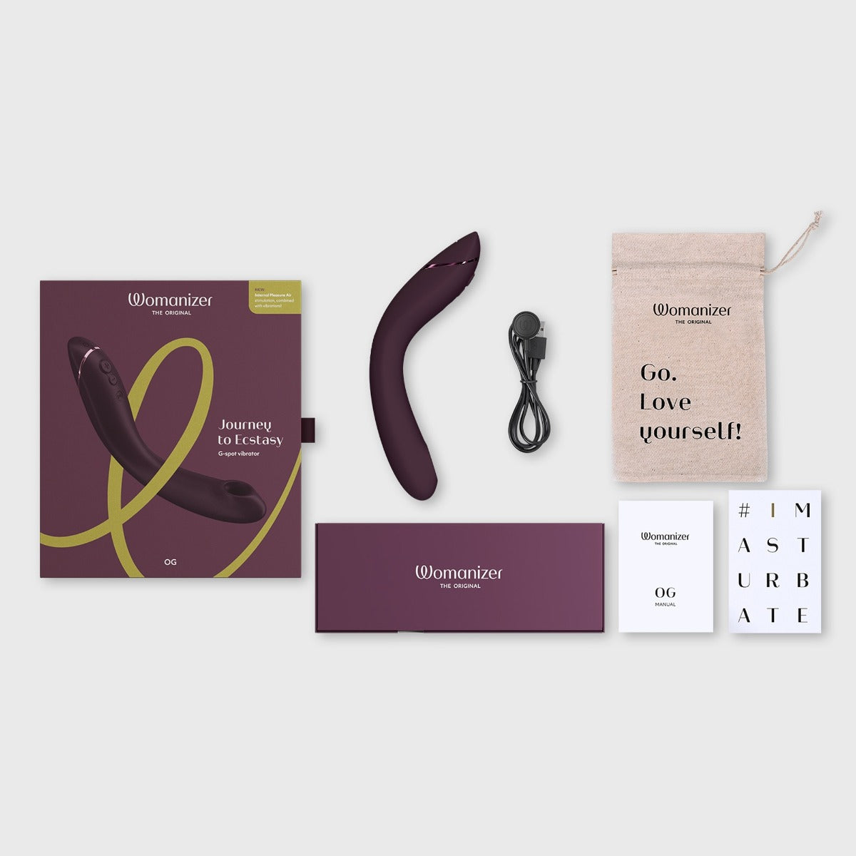 Womanizer OG Waterproof Vibrator Contents In Packaging, Aubergine