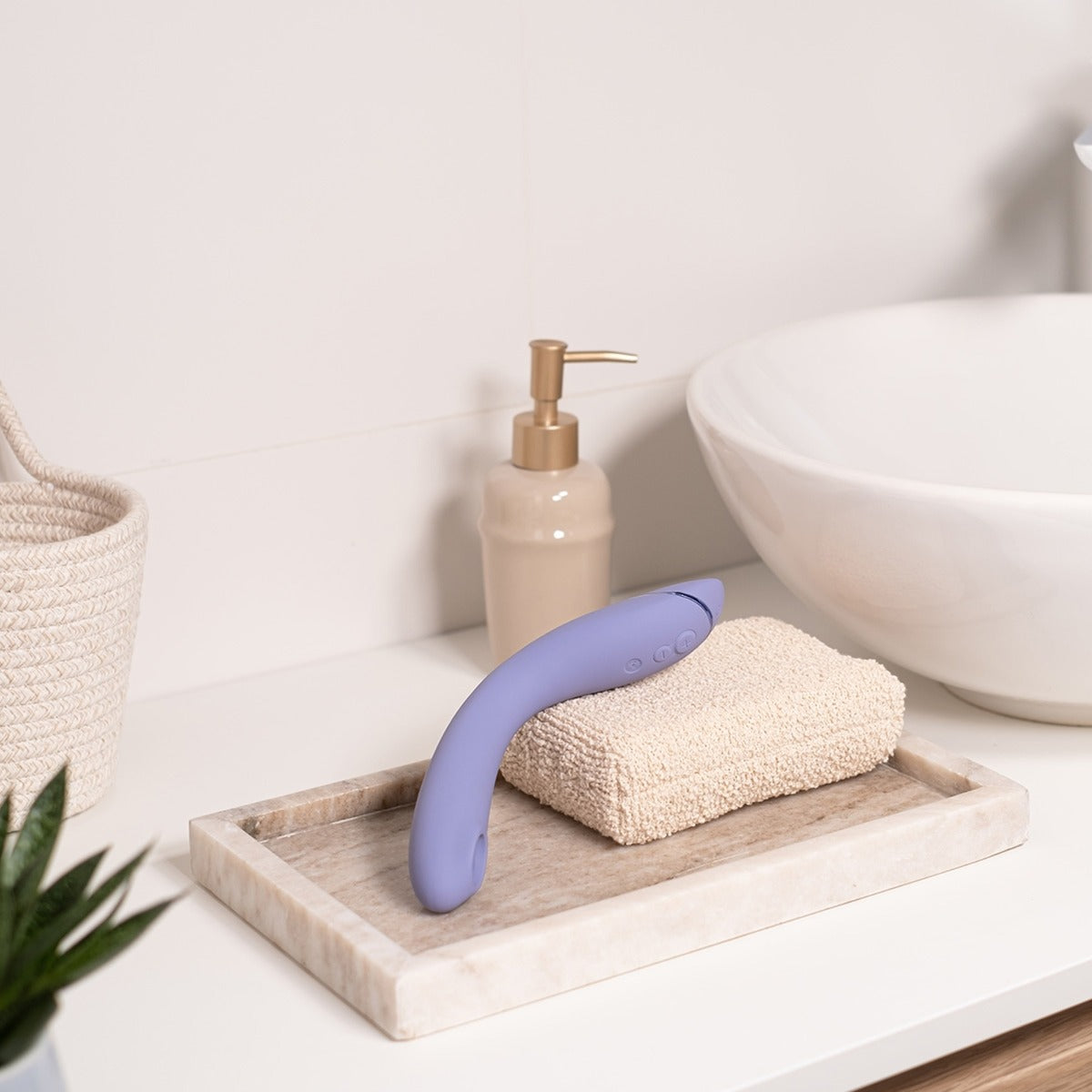 Womanizer OG Waterproof Vibrator Next To Bathroom Sink, Lilac
