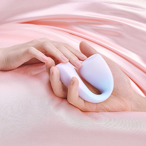 Two hands holding C-Tail purple