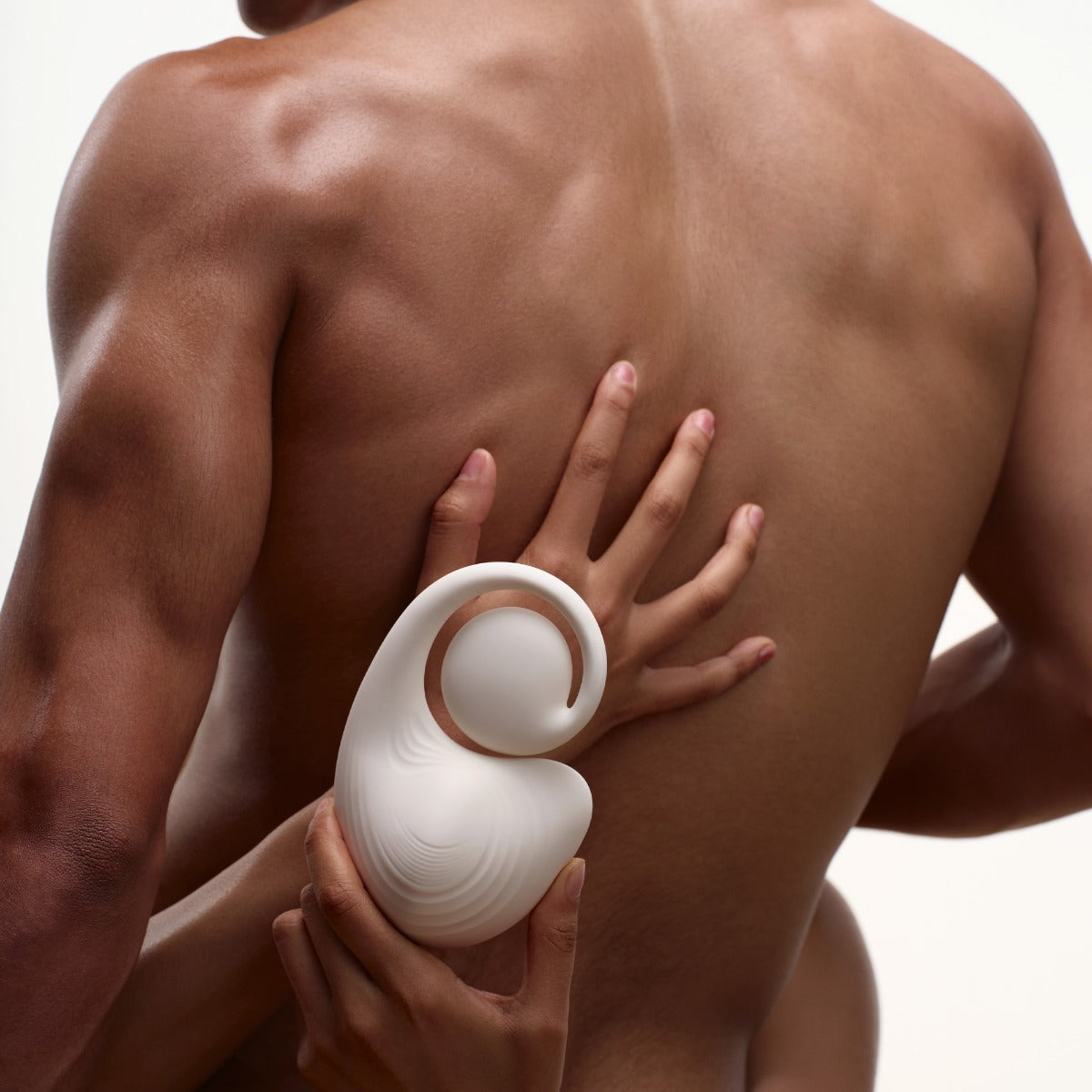 Arms holding Puzzle wrapped around man