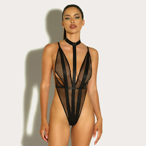 Woman posing in Wilde mesh teddy harness