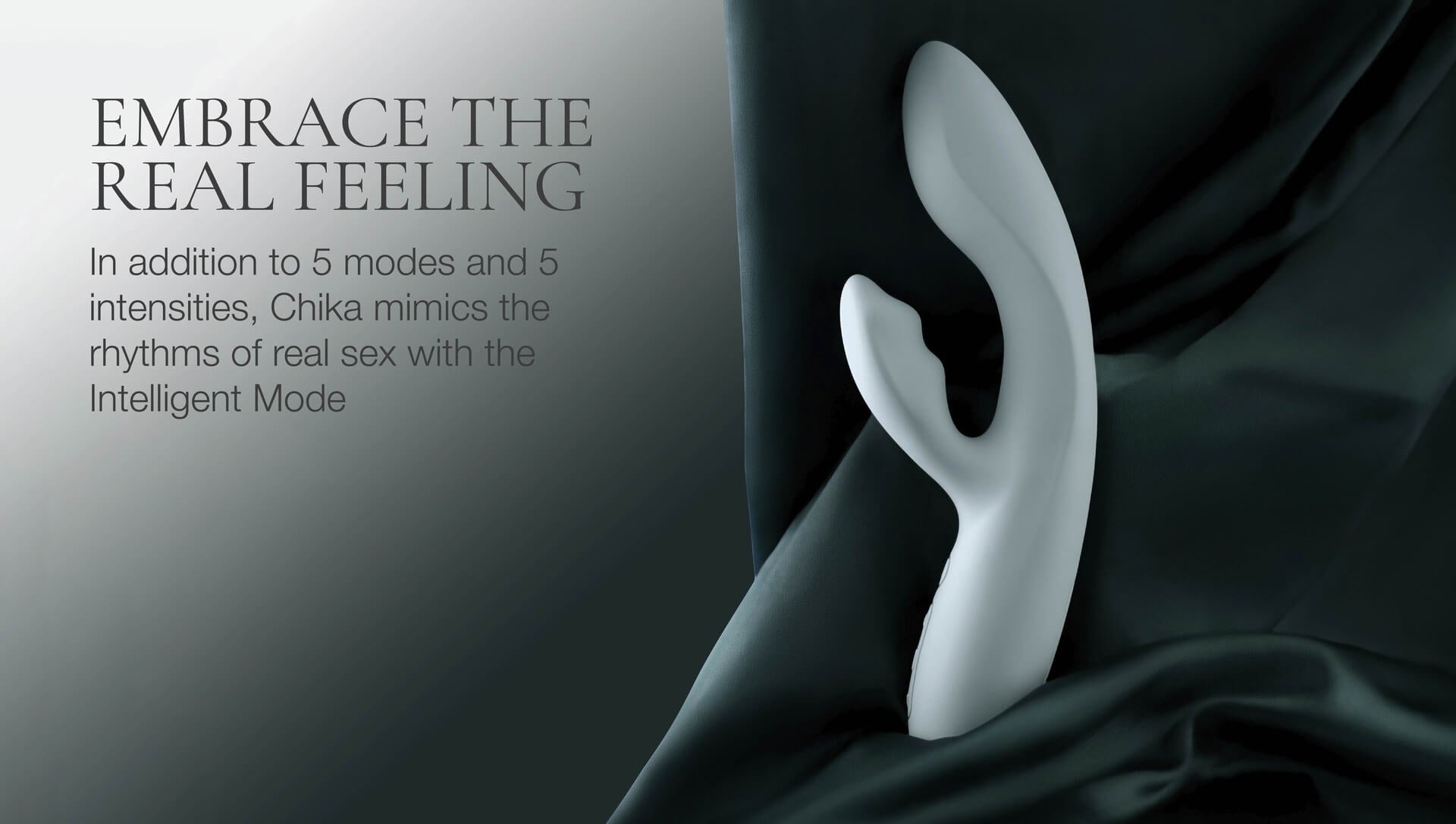 Blue sex toy with black fabric background and promotional text on a gray background