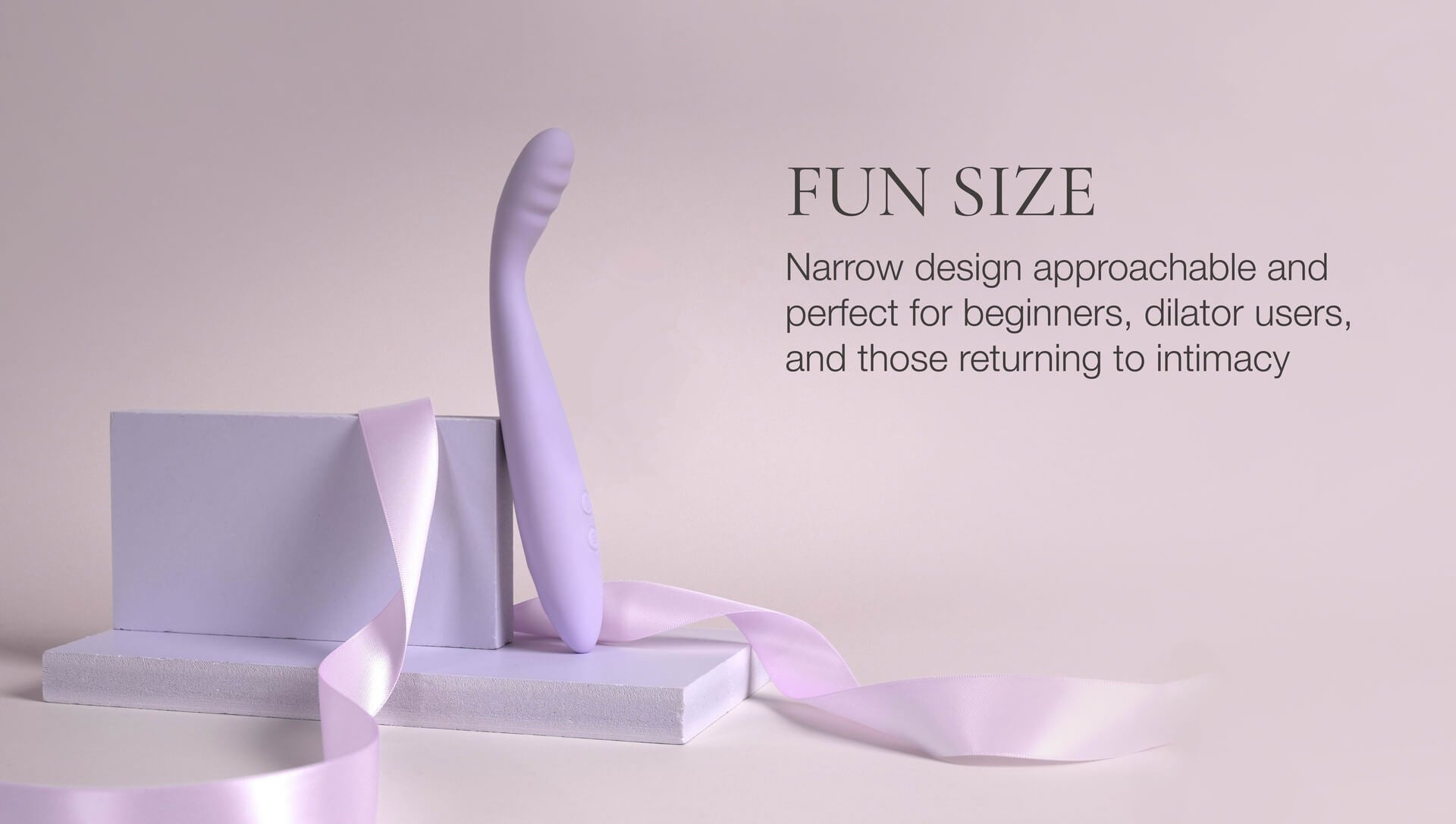 Purple vibrator on a stand with text about its size and use on a light gray background