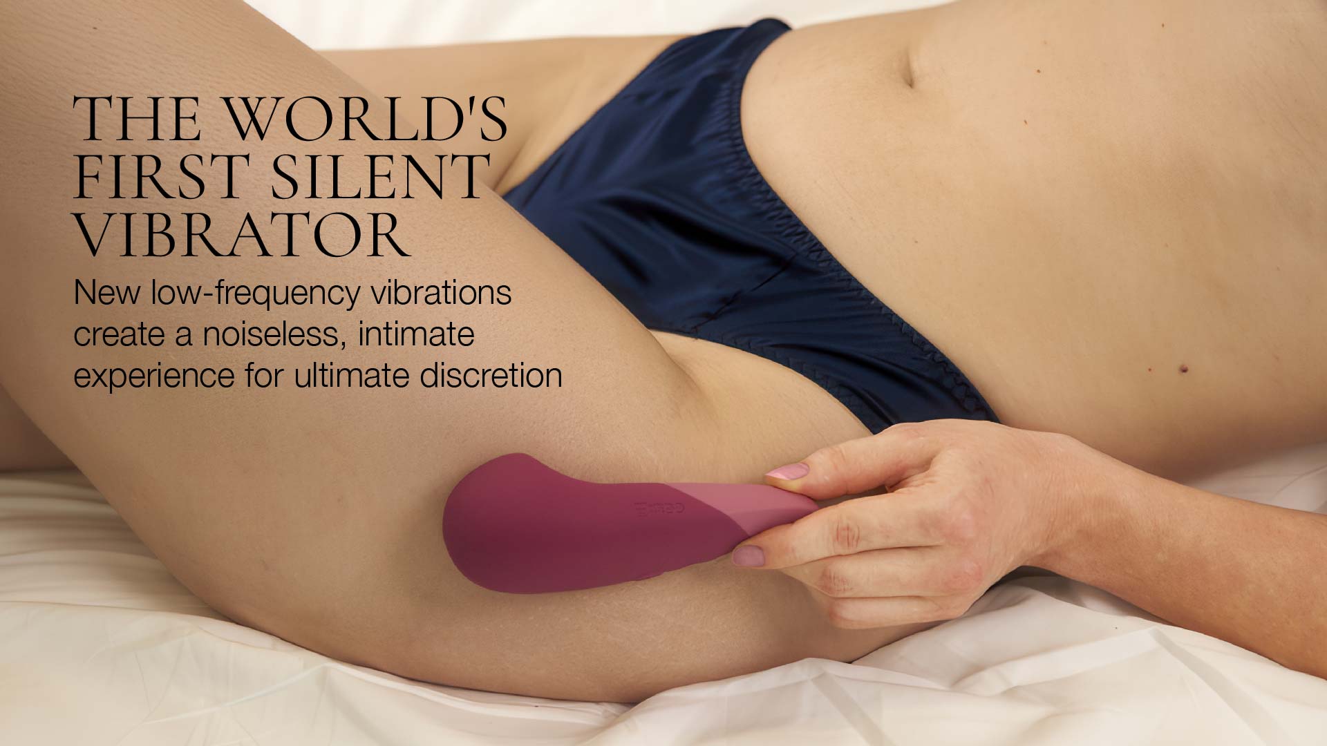 Person using a purple silent vibrator with text about its features.
