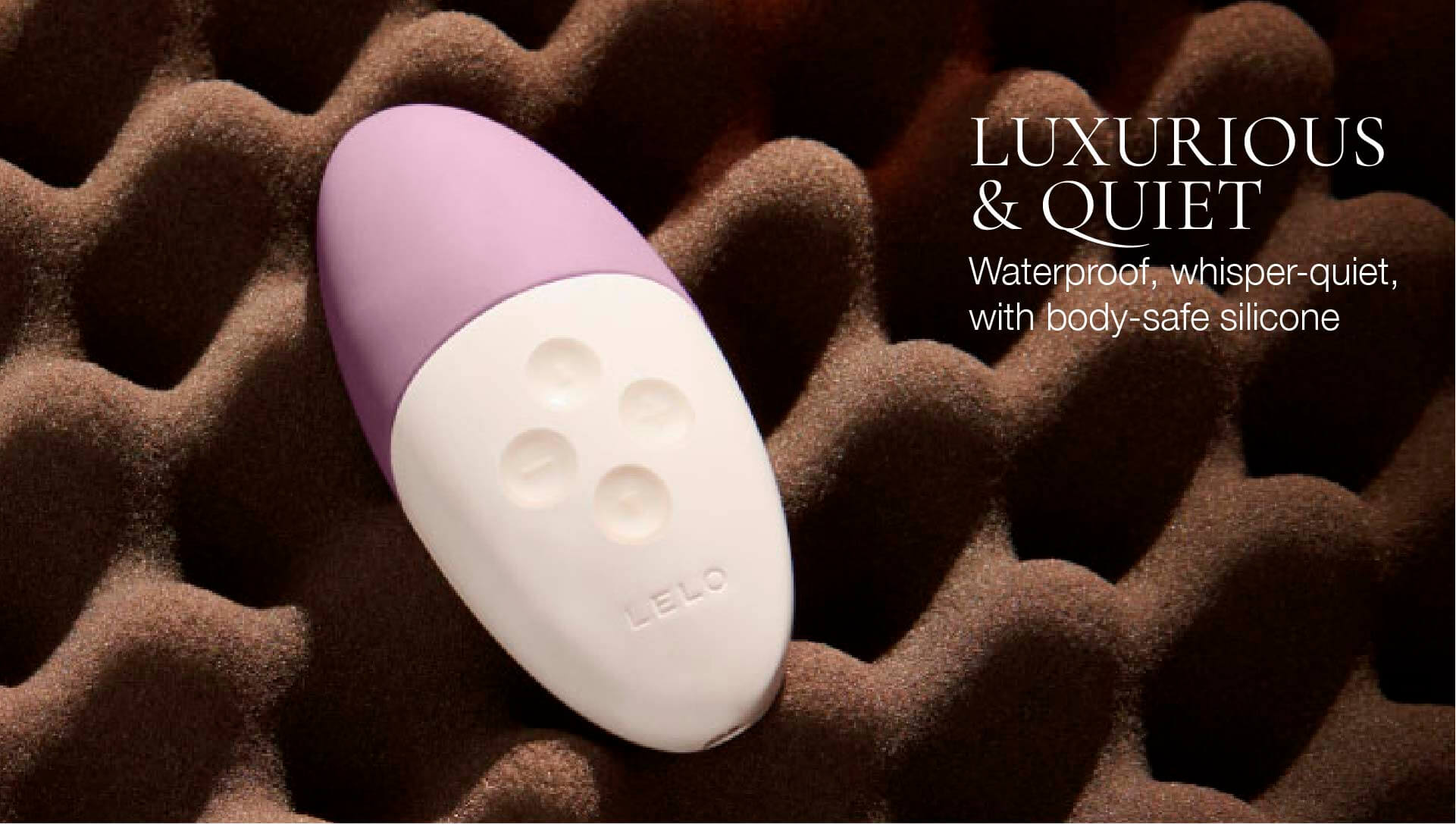 Purple and white silicone product on a textured brown surface with text about features.