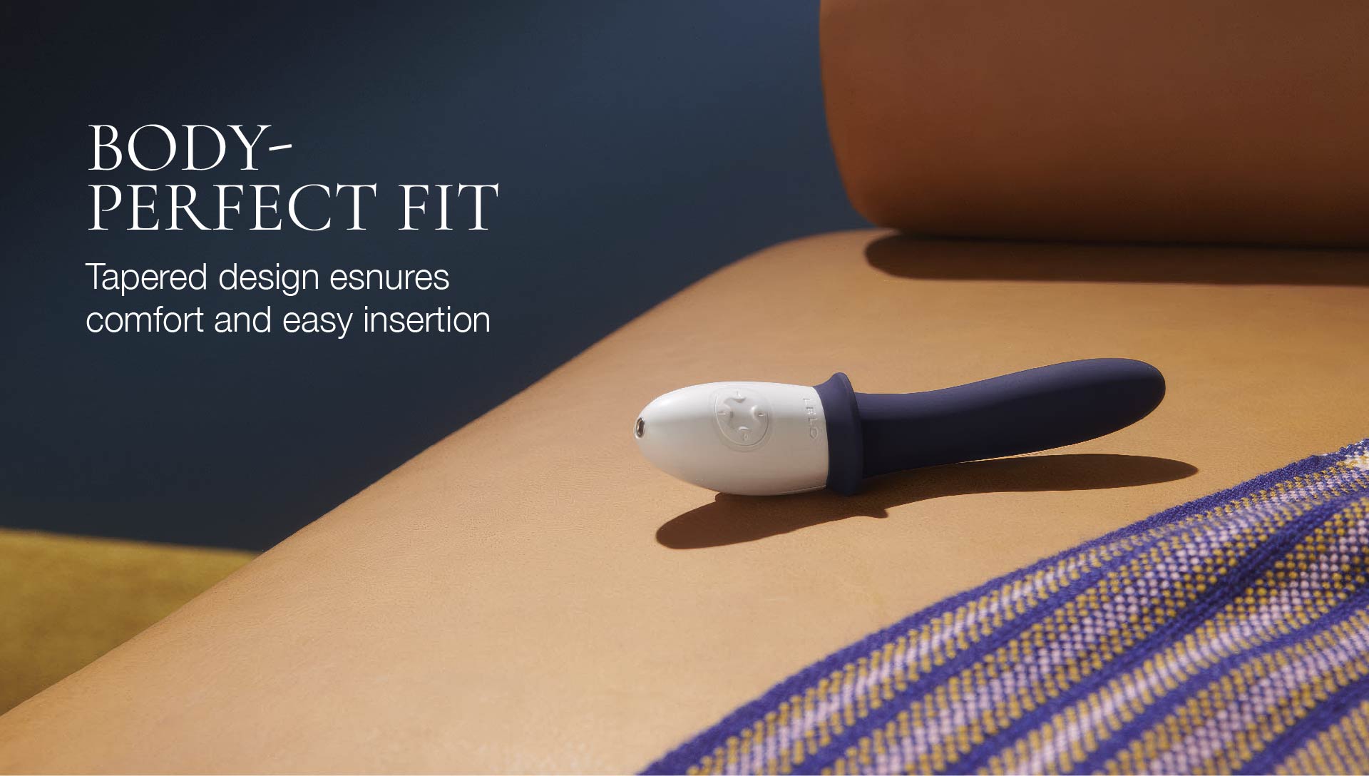 Product with text 'BODY-PERFECT FIT' on a beige surface with a blue background