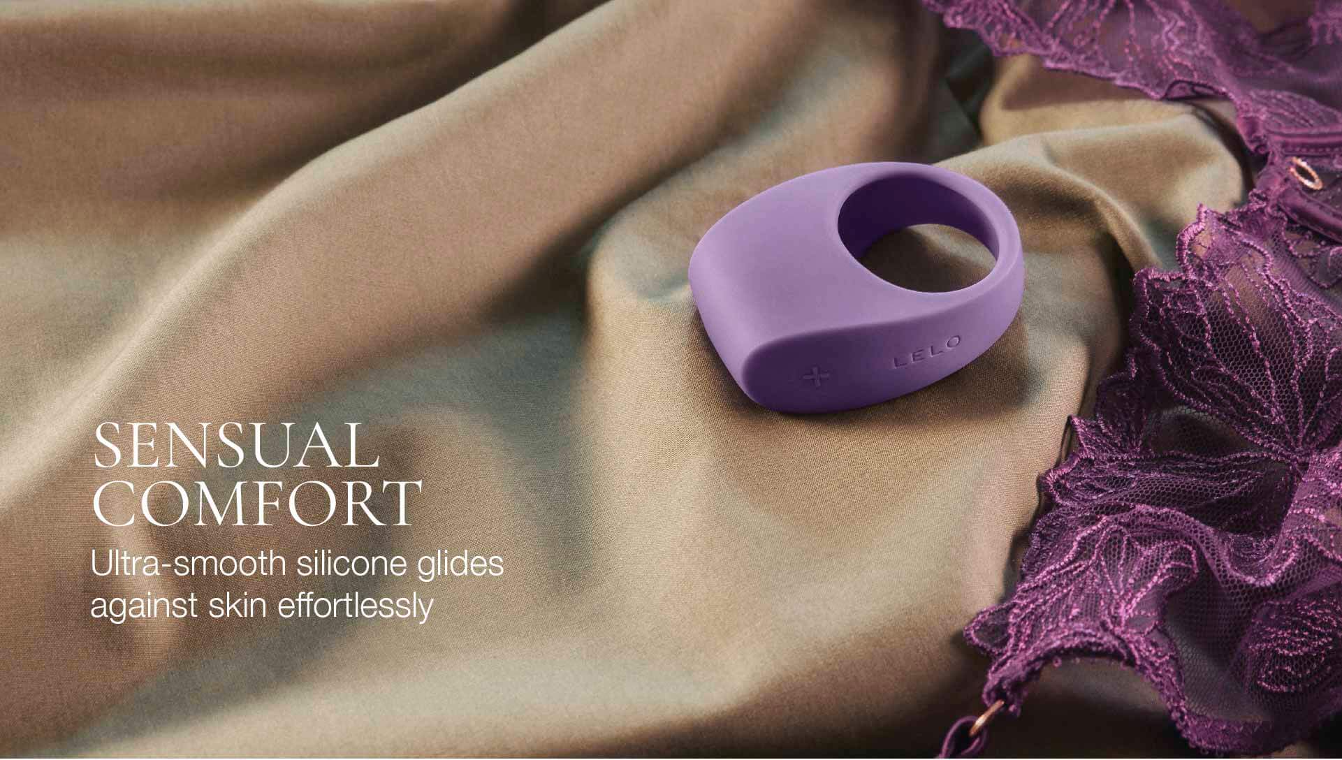 Purple silicone ring on beige fabric with text about sensual comfort