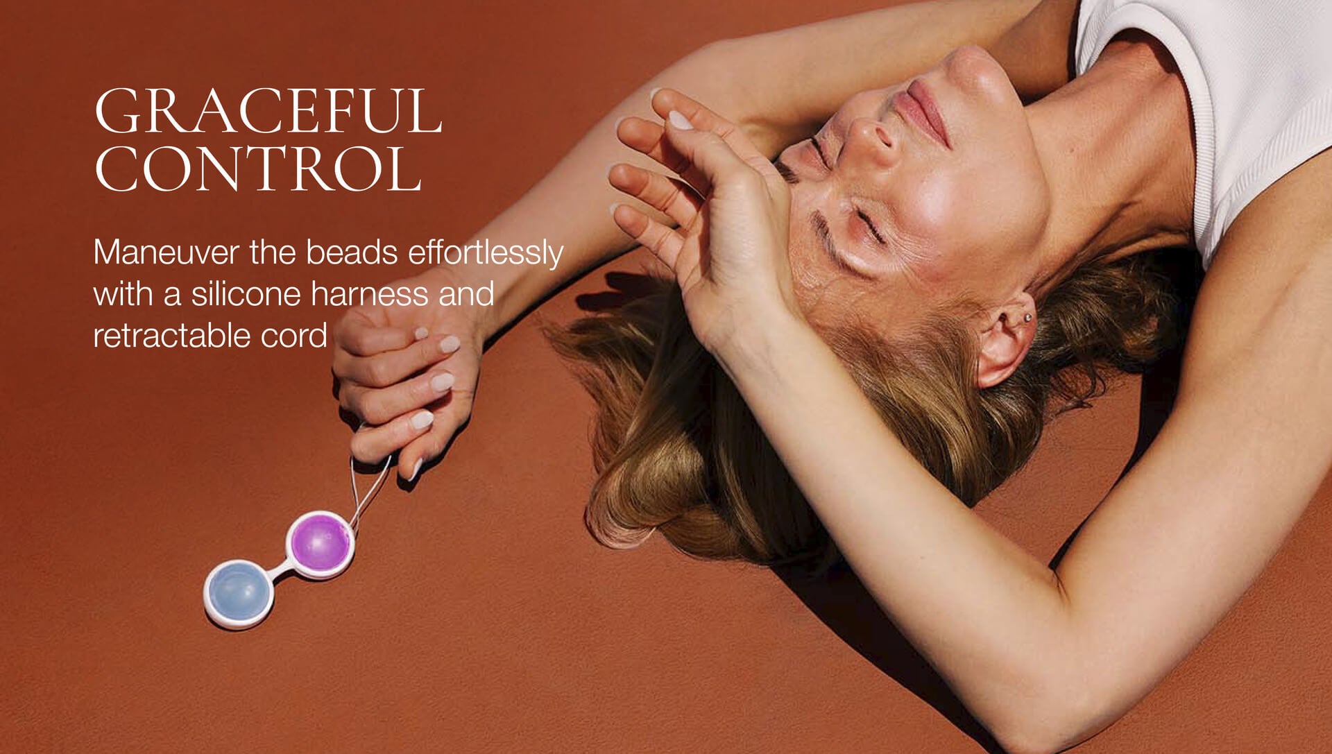 Woman lying on a brown surface with text about 'Graceful Control' product.