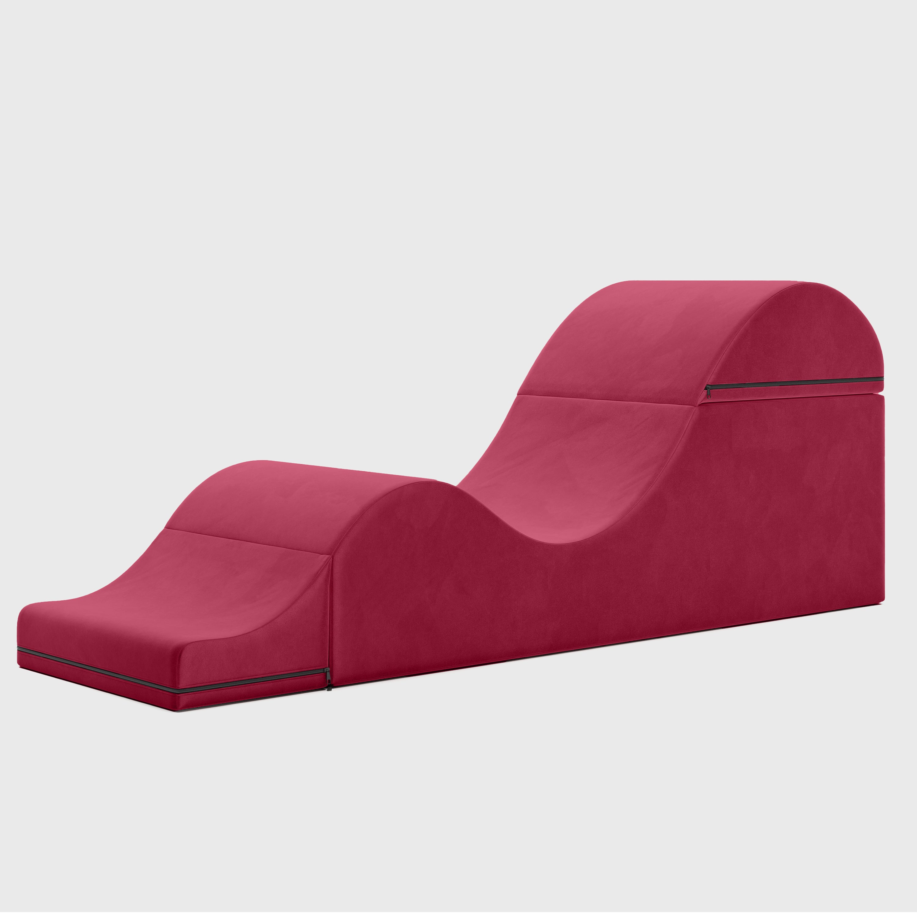 Red chaise lounge on a light gray background
