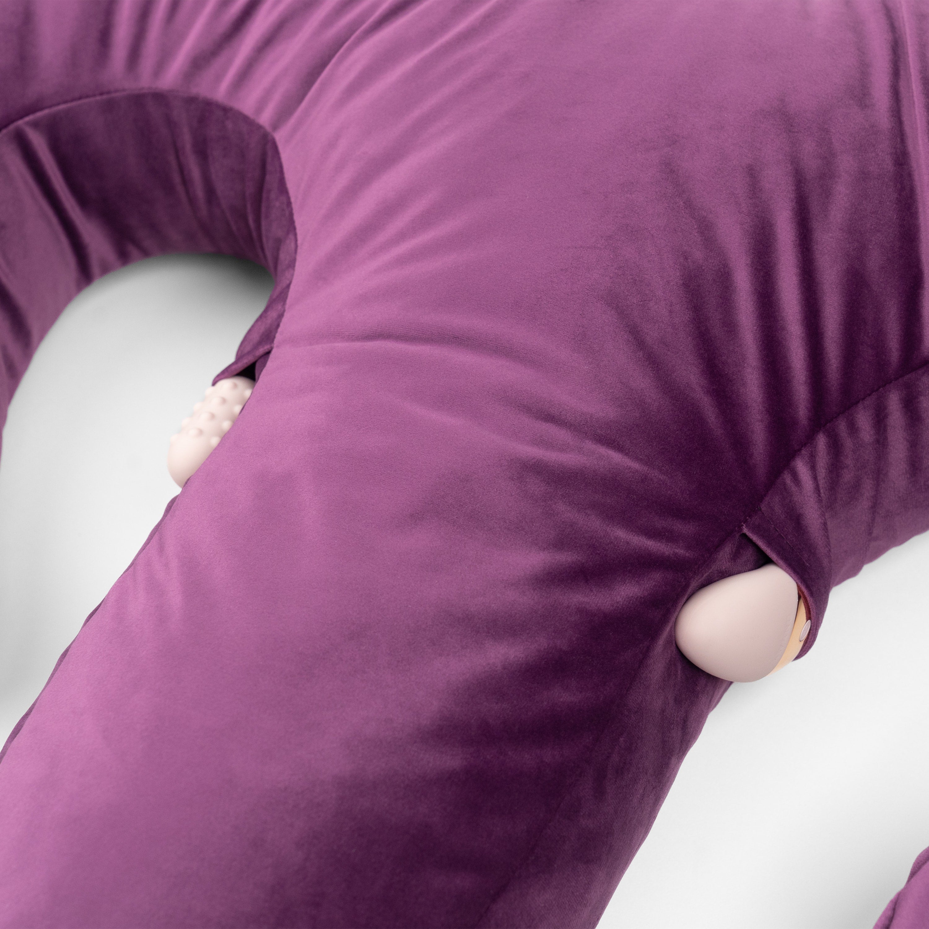 Close up shot of the Arie Toy Mount Sex Pillow holding bullet vibrators