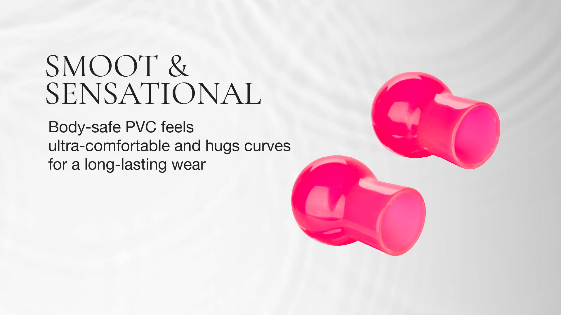 Two pink silicone suckers on a white background with text about comfort and wear.