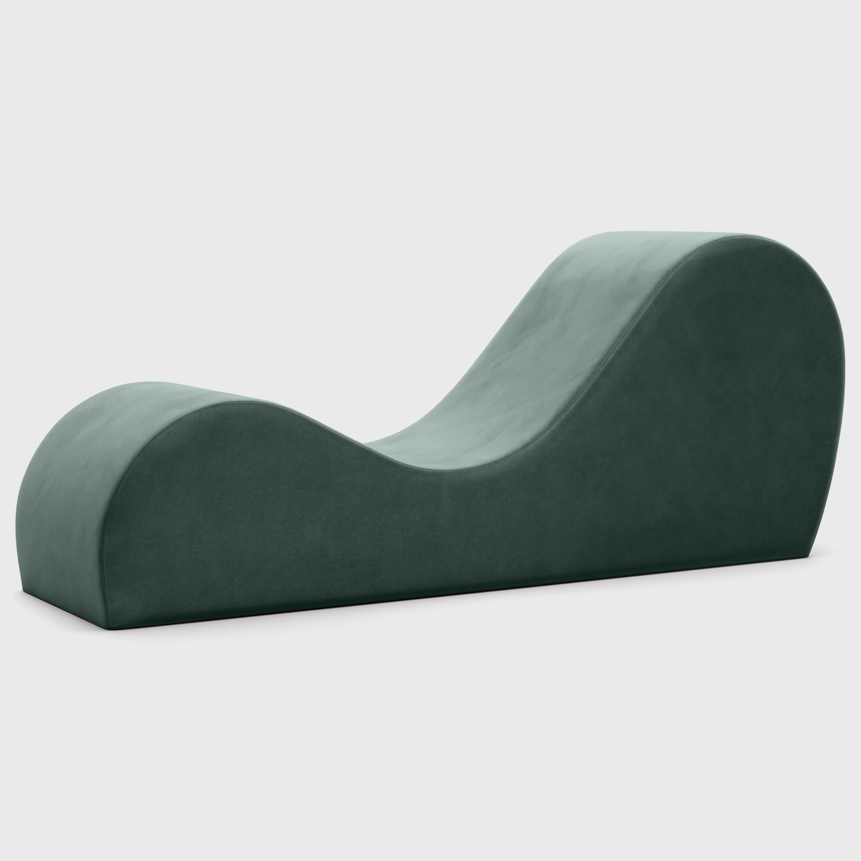 Green curved chaise on a white background