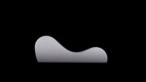 White chaise on a black background