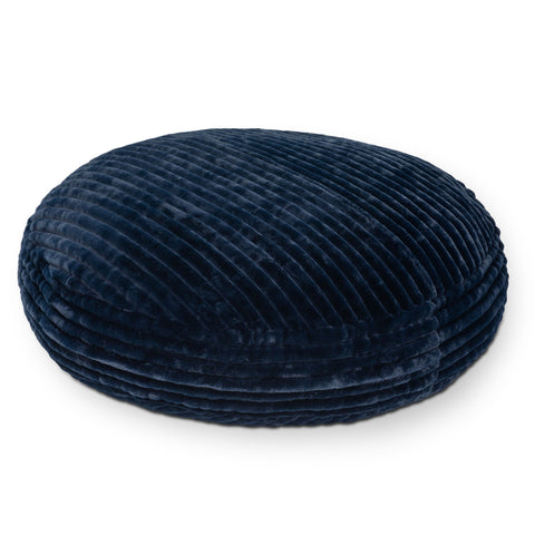 Navy blue textured round cushion on a white background