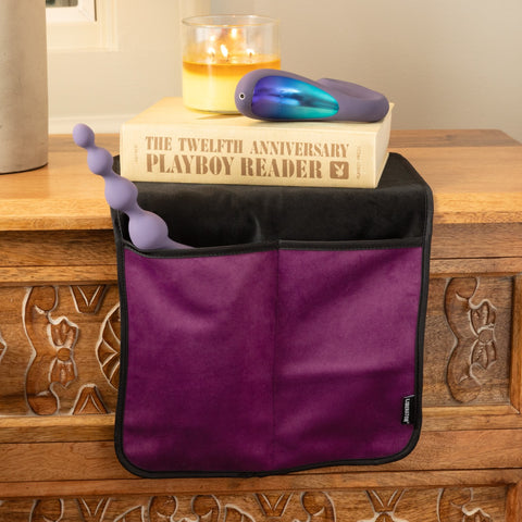 Fascinator Bedside Toy Storage Caddy hanging on nightstand with sex toys