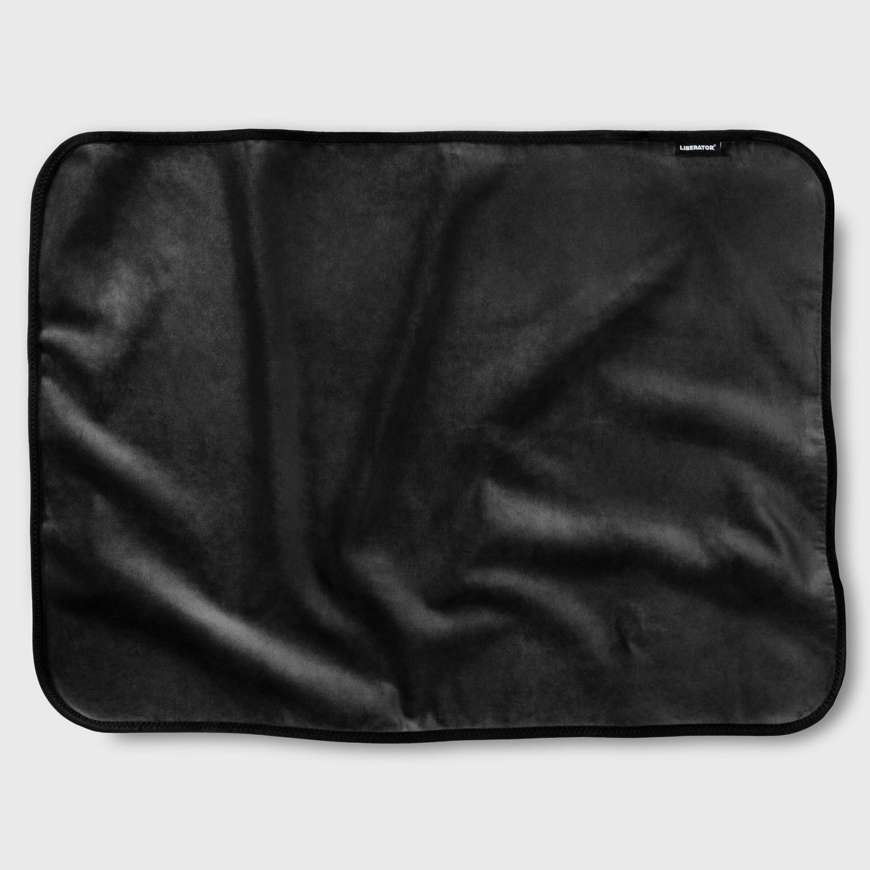 Black fabric mat on a light gray background