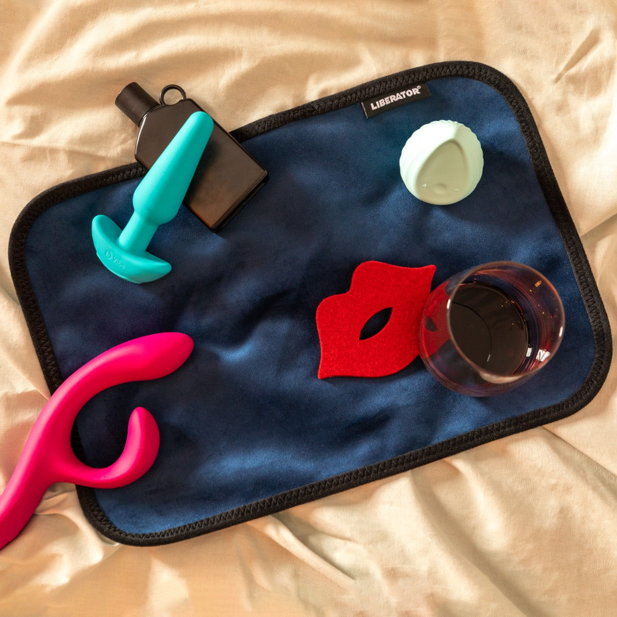 Fascinator Toy Pad with toys on top of it