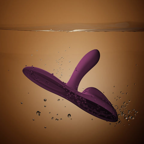 Zalo Flora App-Enabled Lay On Vibrator in water indicating that it is waterproof