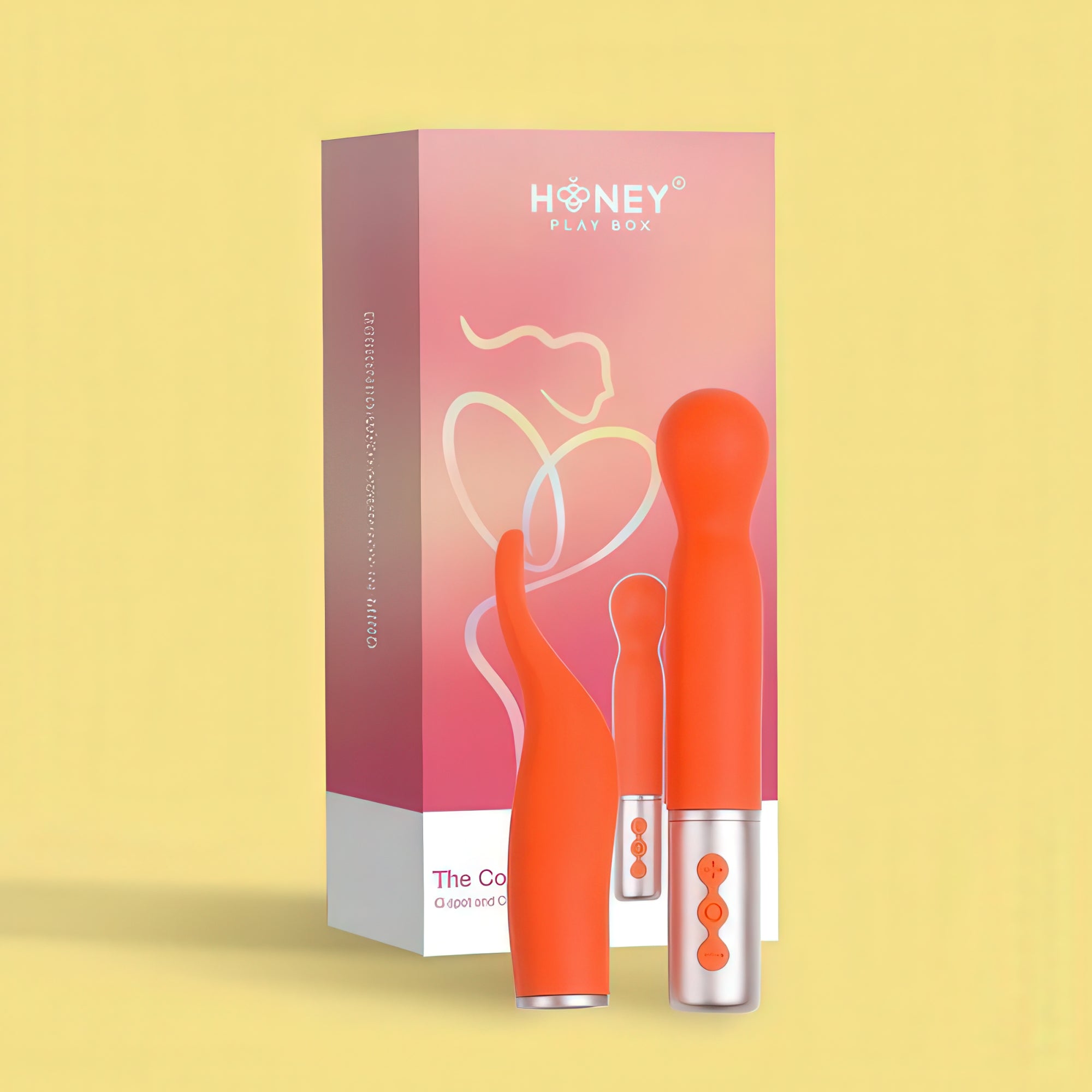 Orange and silver electronic device with packaging labeled 'Honey Play Box' on a yellow background