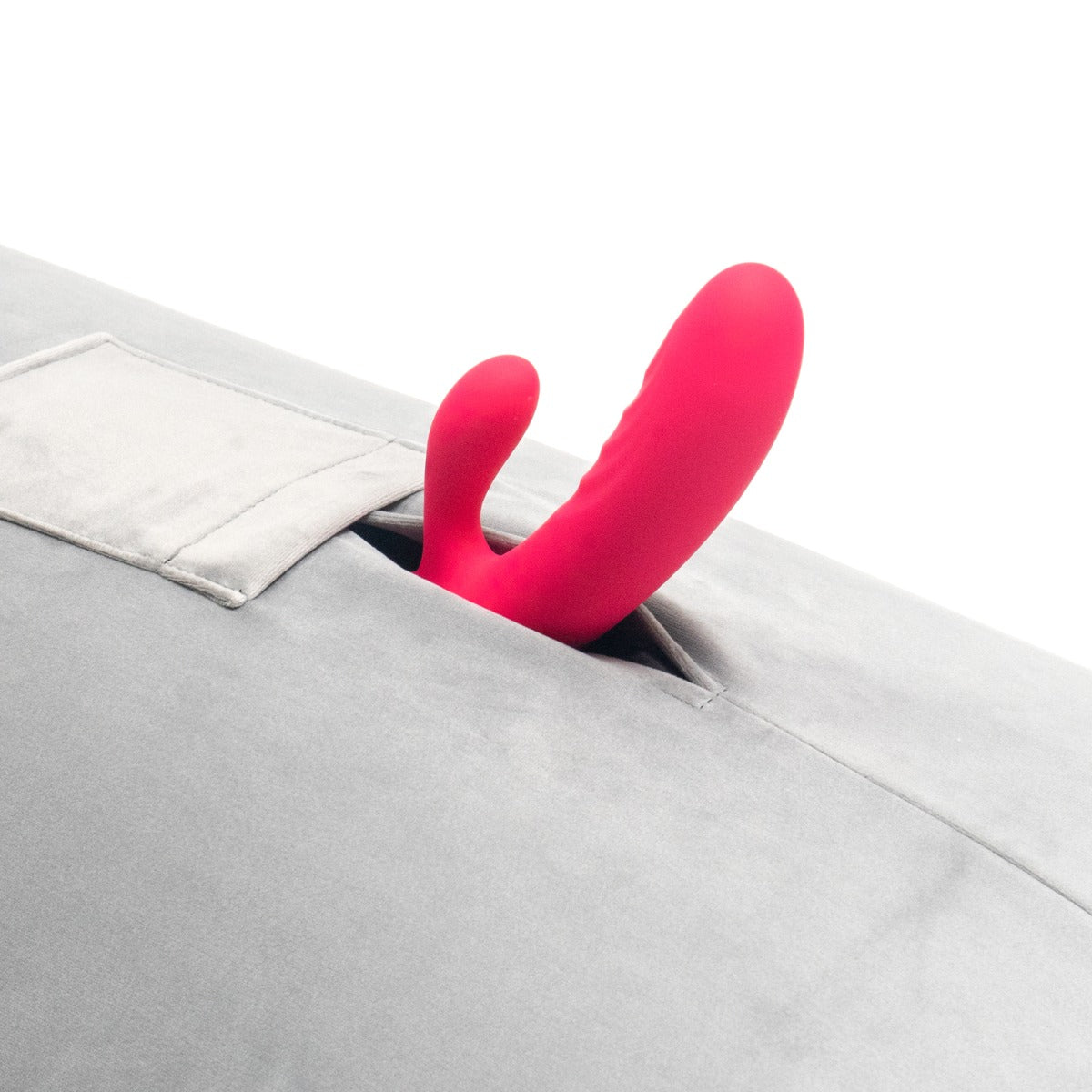 Humphrey Sex Toy Pillow Mount holding a toy