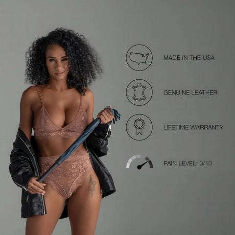 Woman in lingerie holding a leather flogger with product features on a gray background
