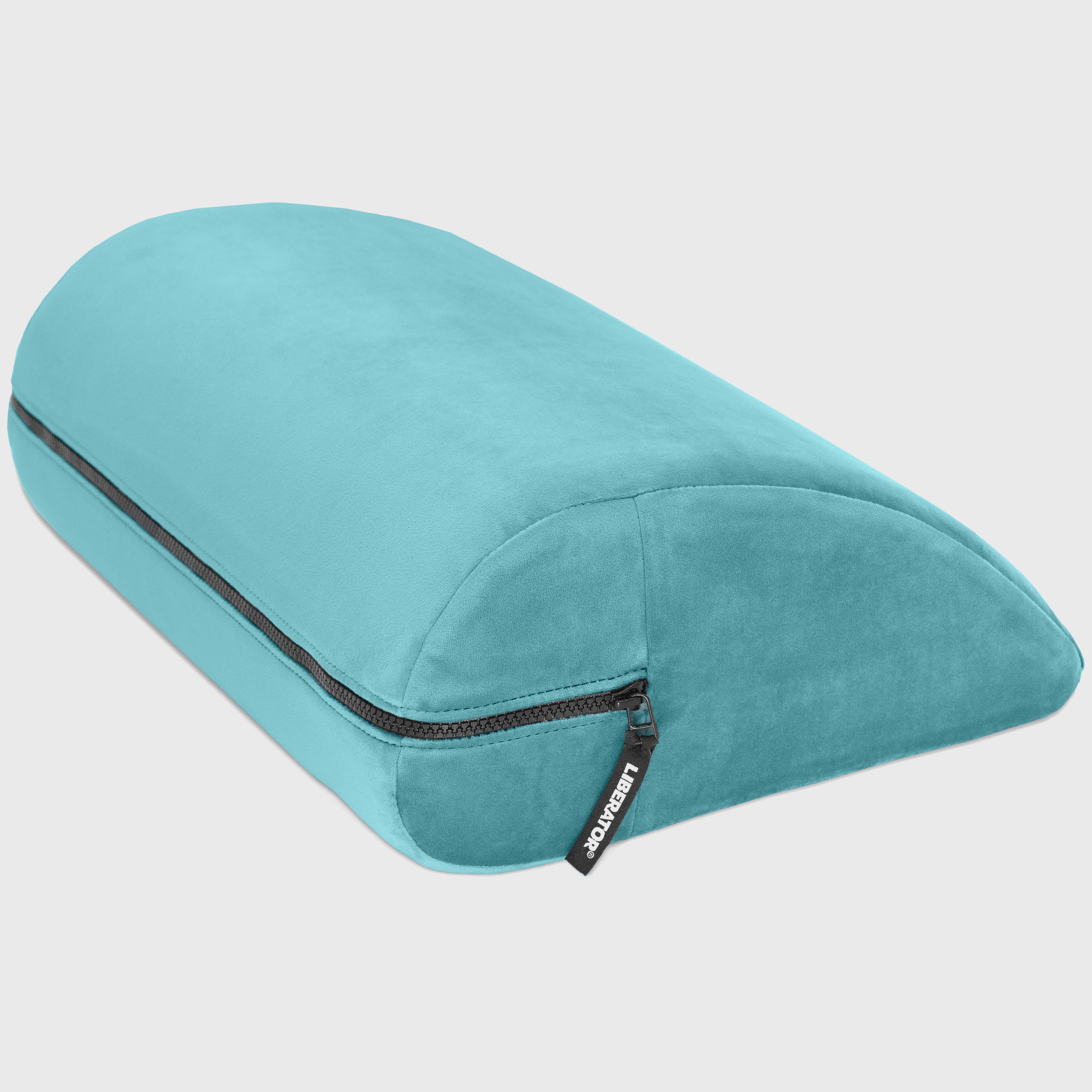 Turquoise travel pillow with a zipper on a light gray background