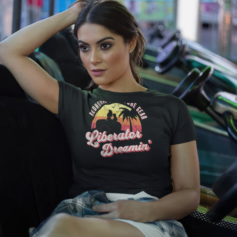 Woman sitting in a go-cart wearing the Liberator Dreamin' T-shirt