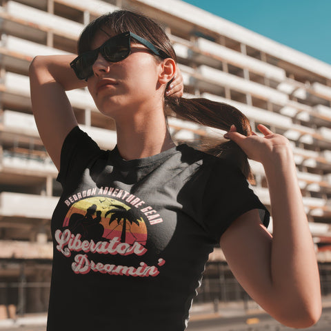 Woman wearing sunglasses outside wearing the Liberator Dreamin' T-shirt