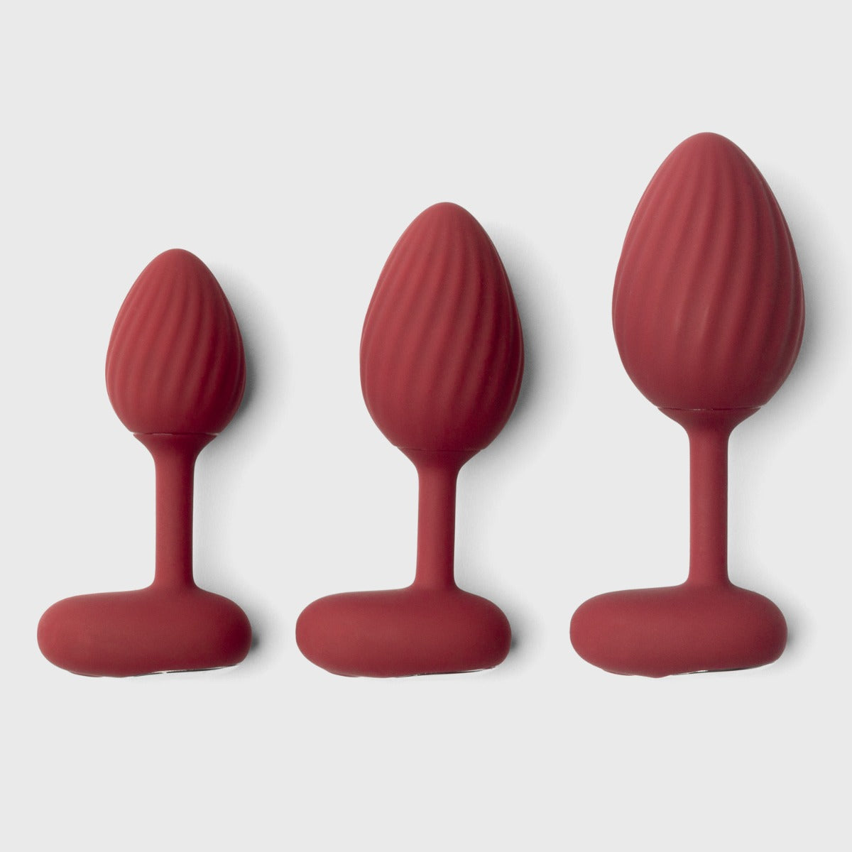 Three pieces of Rouge Training Kit on grey background