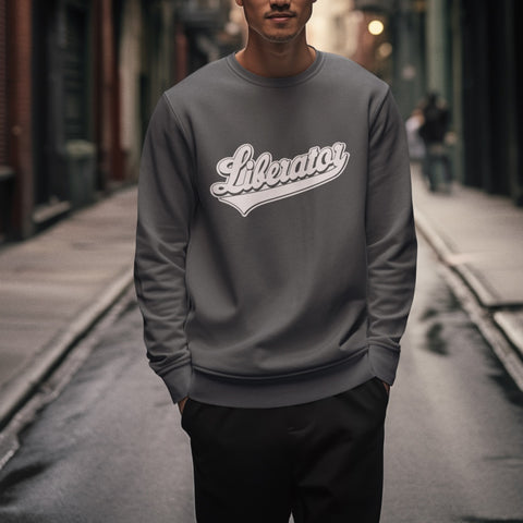 Man wearing the grey Liberator Baseball Logo Sweatshirt in the street
