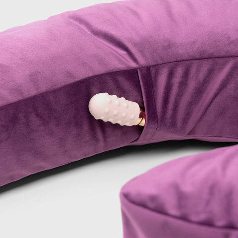 Close up of the Lune Toy Mount Sex Pillow with a bullet vibrator inside it's hidden pocket