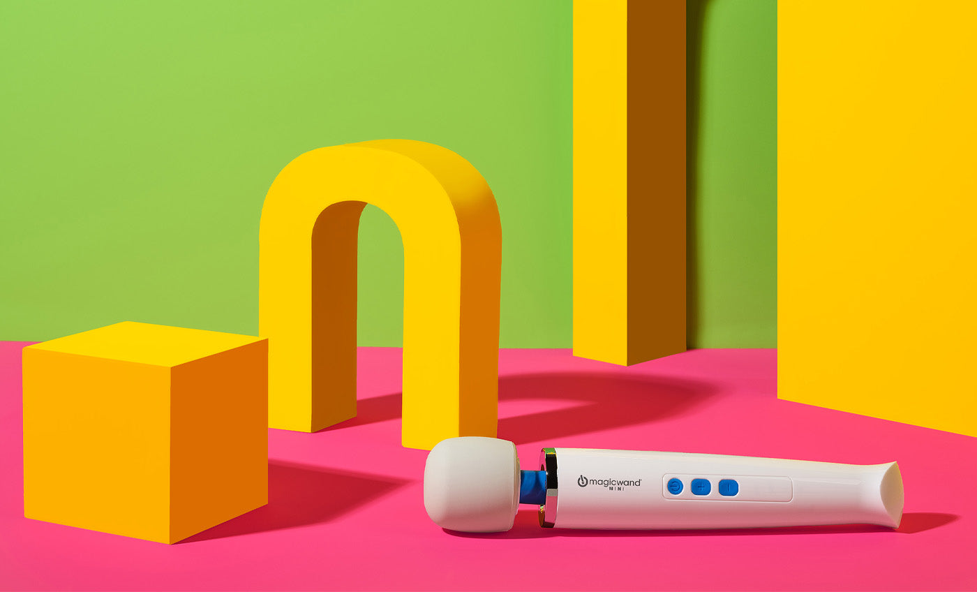 Magic wand mini white color with a colorful abstract background