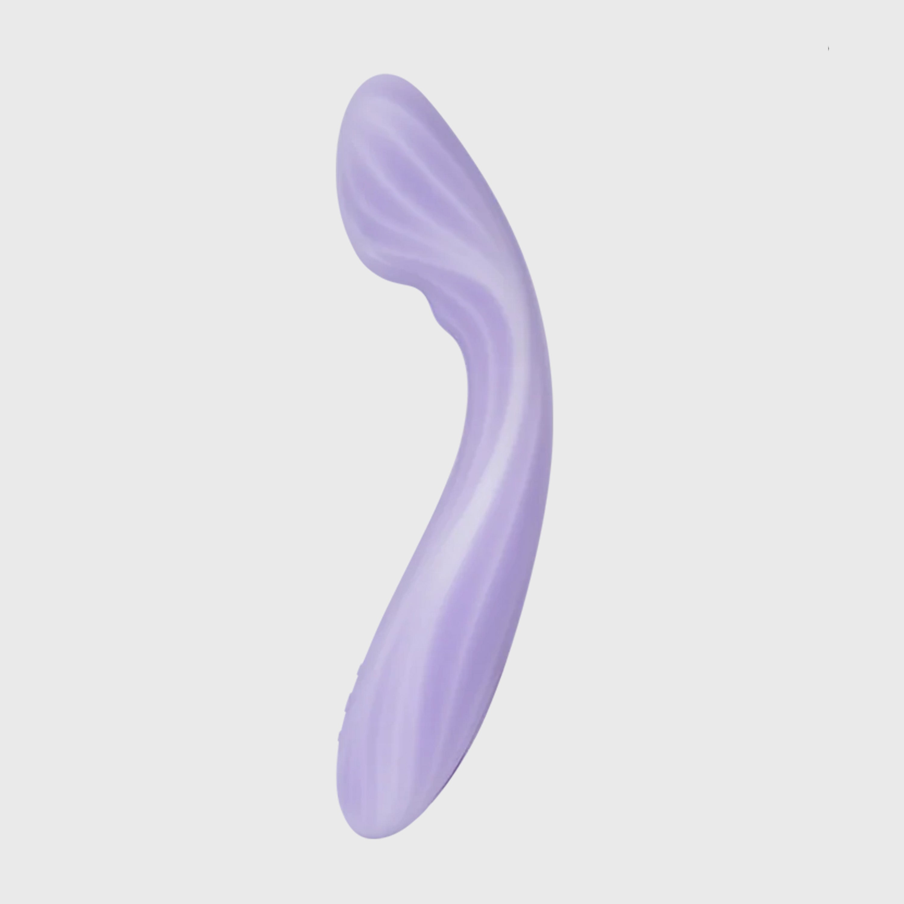 Purple curved vibrator on a light gray background