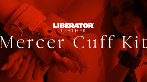 Liberator Leather Mercer Cuff Kit with a person wearing a cuff on a red background
