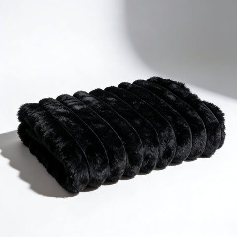 Fascinator Fur Luxe in black folded on white background