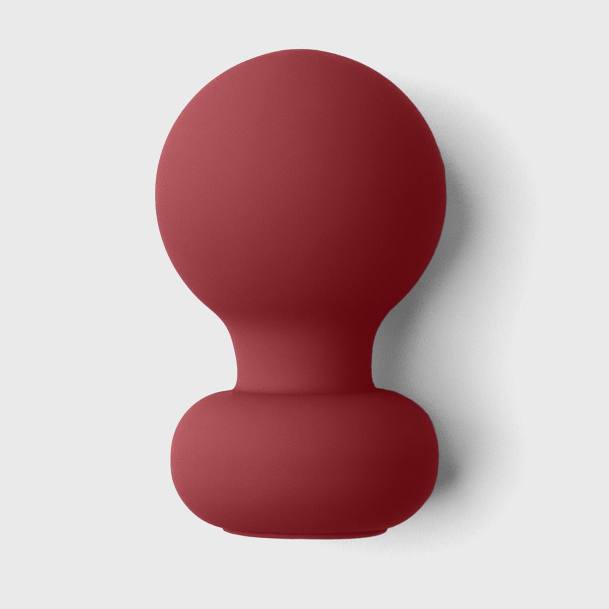 Liberator Palm Vibrator on grey background