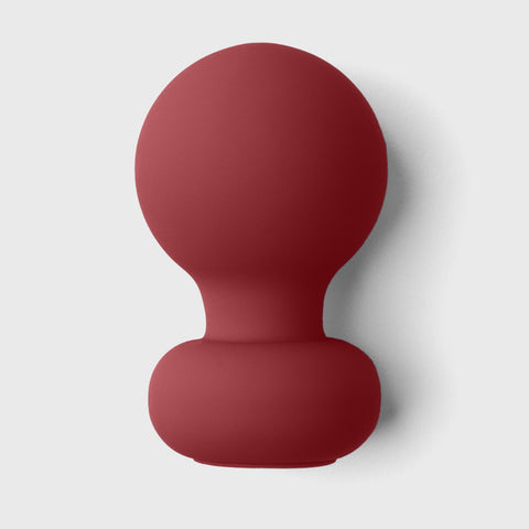 Liberator Palm Vibrator on grey background